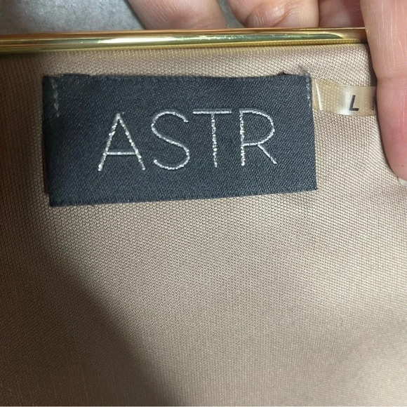 ASTR Leopard Print Crossover Ruffled Long Sleeve Romper - Picture 6 of 9